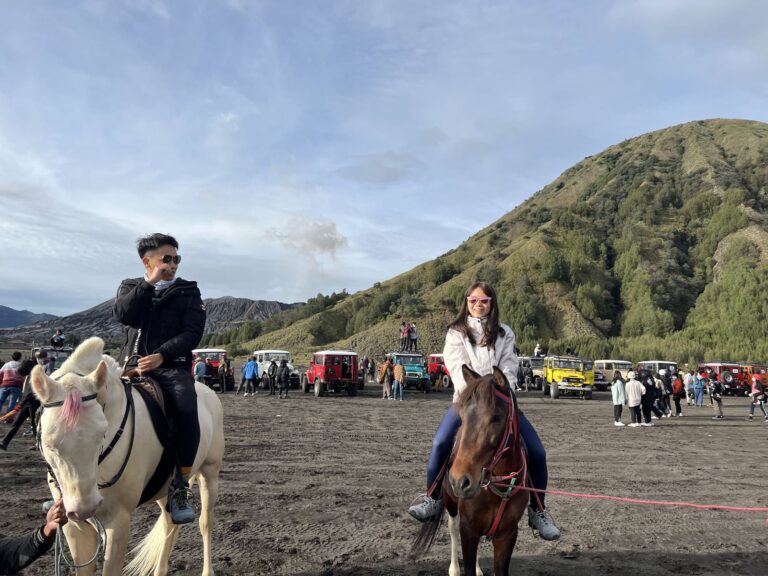 Horse riders on the Sea of Sand at Bromo