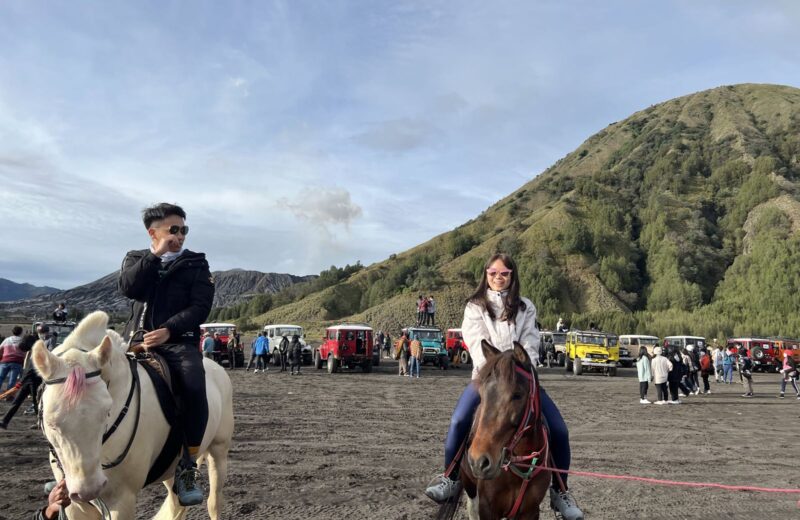 Horse riders on the Sea of Sand at Bromo