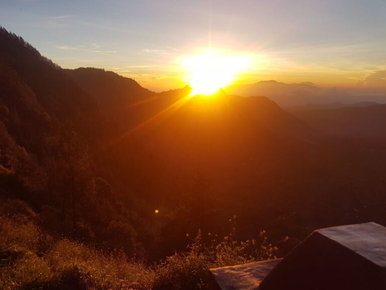 Sunrise glow over the ridge at the Bromo viewpoint