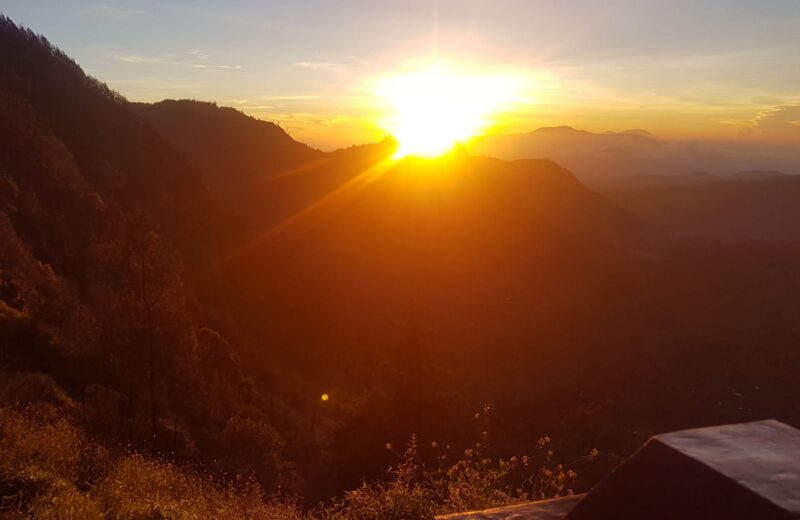Sunrise glow over the ridge at the Bromo viewpoint