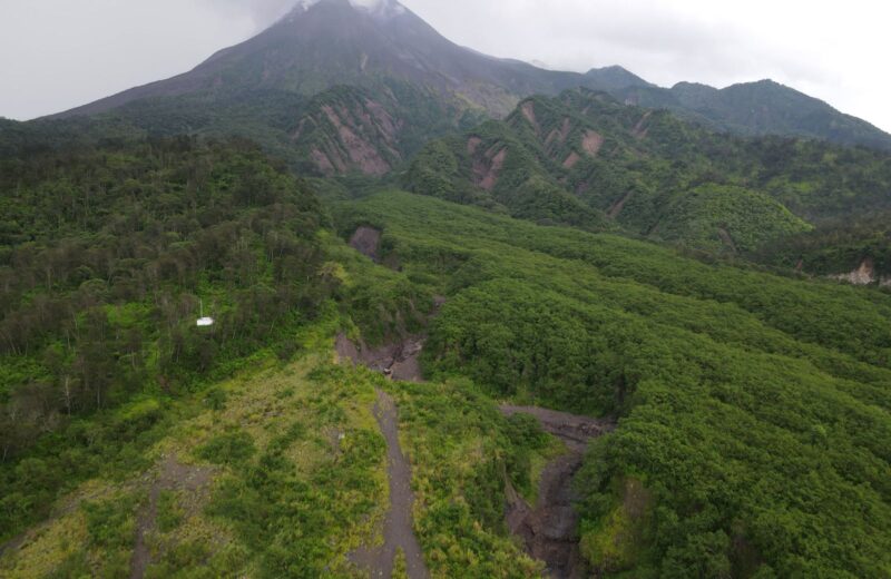 Mount Merapi and the green valley of old lava flows